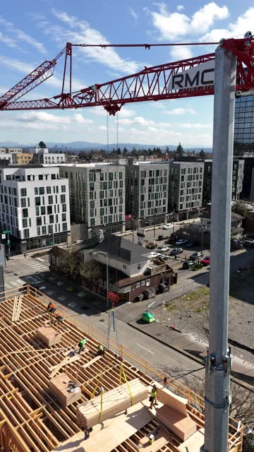 Crane lift with the Seattle skyline behind