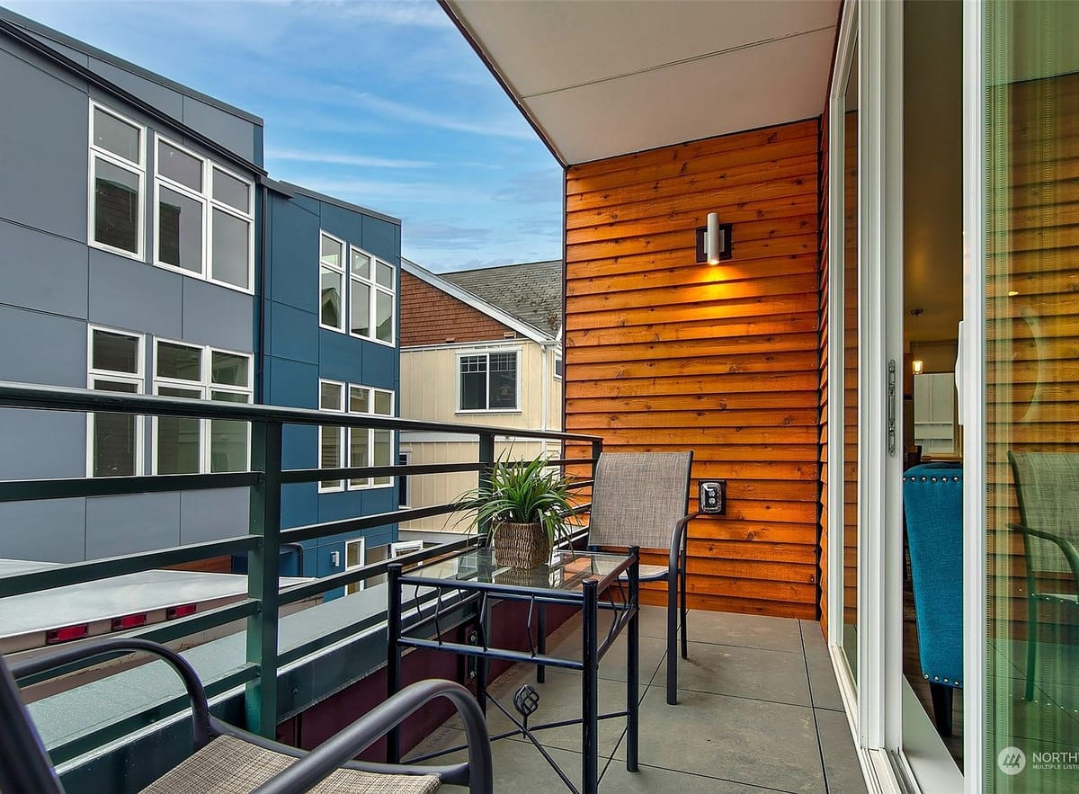 Balcony with wood-accent siding