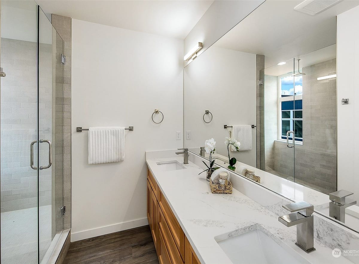Primary bath with double vanity and glass shower